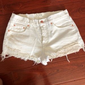 Off white Free People Jean shorts with lace.